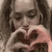 Emoji woman_kiss_heart_hands